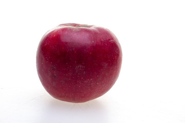 Red apple on a white background.
