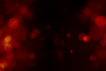 Red bokeh circles defocus glitter blur background. Bokeh abstract background.