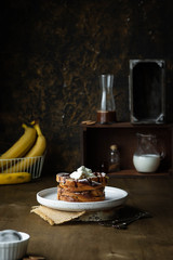 Toast with banana and curd cheese. A simple idea for breakfast.