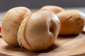 Italian semi hard handmade smoked scamorza cheese, from cow milk from Apulia or Calabria regions