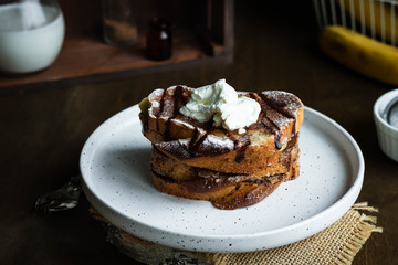 Toast with banana and curd cheese. A simple idea for breakfast.