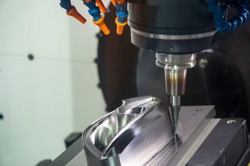 The machining center cutting the injection mold parts by solid barrel tool endmill. The hi-technology mold and die production by CNC milling machine.