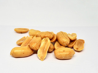 peanuts on a white background. Seasoned peanuts, isolated on a white background. 