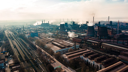 Fototapeta na wymiar metallurgical production plant full cycle smoke from pipes bad ecology aerial photography