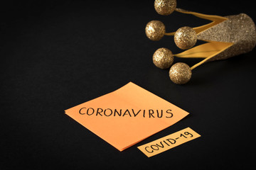 CORONAVIRUS. Sticker with the words coronavirus on a dark background.The concept of protection from viruses. Selective focus.
