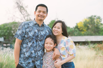 Asian family with  father mother and daughter have smiling and happy
