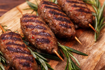 Lula kebab, lyulya-kebab minced meat. grilled with rosemary. Fast food