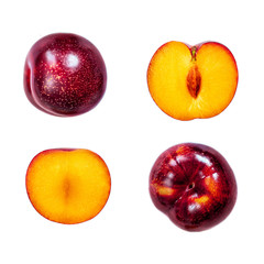 Plums fruits with leaves isolated on white Background, closeup. Tropical abstract background..