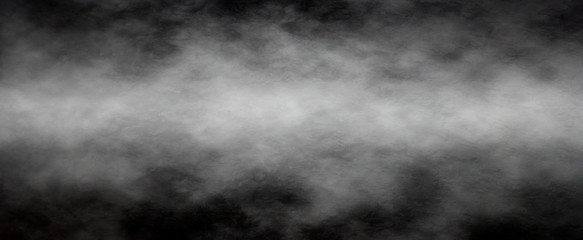 Panoramic view of the abstract fog or smoke move on black background. White cloudiness, mist or smog background.