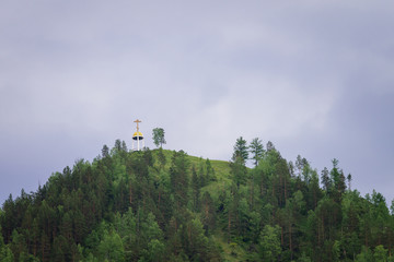 Dome church with cross for people coming and praying.