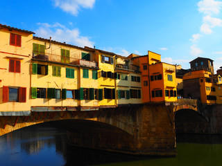 Fototapeta na wymiar View of the Ponte Vecchio bridge. It is a medieval bridge over the Arno River, in Florence, Italy.