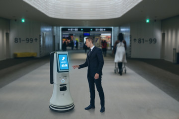 smart hotel in hospitality industry 4.0  concept, the receptionist robot (robot assistant ) in...