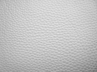  White upholstered leather background. Close-up photos, selective focus.                              