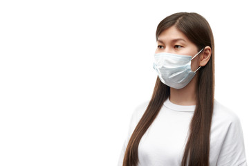 Asian young woman in medical mask portreit on white background isolated