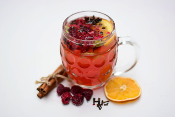 Fruit tea with berries, anise, clove, cinammon and oranges