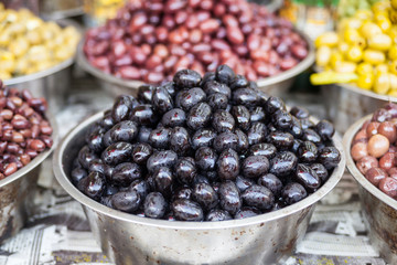 Green and black olives in the oriental market 