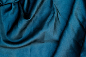 close up abstract blue abric texture background,crumpled or liquid wave fabric background,elegant wallpaper design
