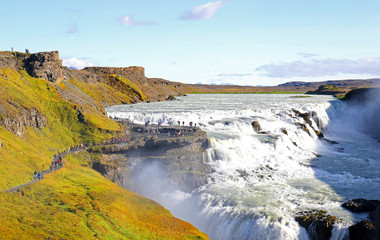 Gullfoss Waterfall is an impressive waterfall shrouded in clouds of mist.  Name meaning Golden Fall in Iceland