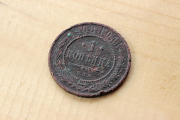 Obverse of an old copper coin, one kopek, from the time of Tsarist Russia, the Romanov dynasty, 1908.