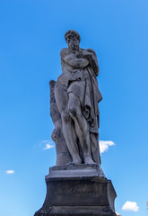 Fototapeta na wymiar Four Seasons Winter statue Ponte Santa Trinita Florence Tuscany Italy