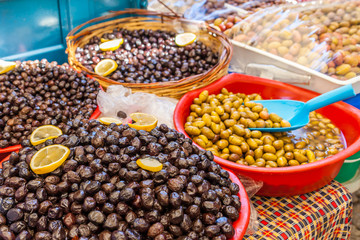 Green and black olives in the oriental market 