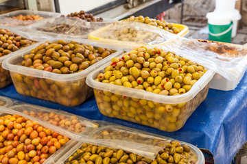 Green and black olives in the oriental market 