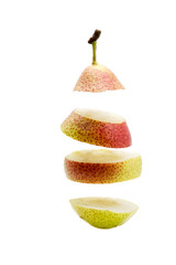 sliced pear pieces on white background