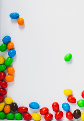 multi-colored nuts in sweet glaze on a white background