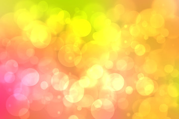 A festive abstract orange pink yellow gradient background texture with glitter defocused sparkle bokeh circles and stars. 