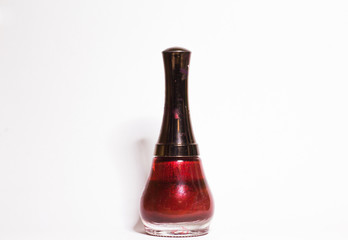 Red Nail polish bottle on white background
