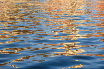On a light river wave reflected bright spots of the building. Abstract. Background.