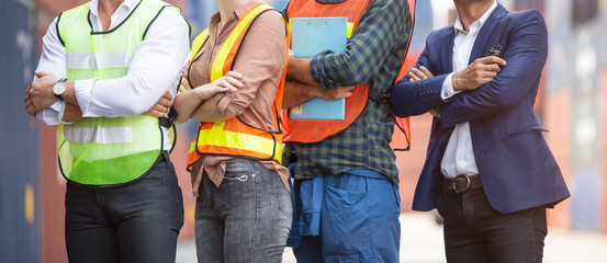 Banner of factory construction site or container warehouse people standing with arms crossed. Logistic business corporate teamwork successful. engineer foreman, assistant and workers working together