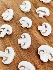 Champignon mushroom slice food plant wooden background macro photo