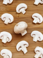Champignon mushroom slice food plant wooden background macro photo
