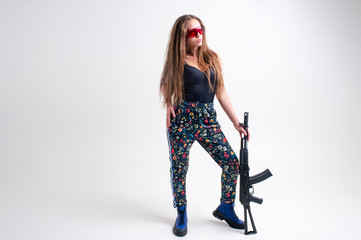 Special agent woman with a black automatic gun