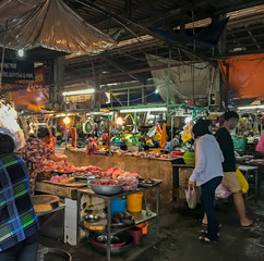 Fototapeta na wymiar Colorful Wet Fish Market Selling Raw Seafood and Meat - Fishmonger Outdoor 
