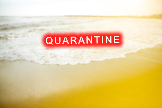 Blurred beautiful sea coast with quarantine text. No summer travel concept. Consequences of coronavirus people isolation. Soft focus photo. - Powered by Adobe