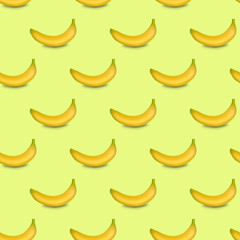 Seamless pattern of a banana isolated on a yellow-green background. Food background