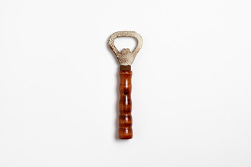 Beer bottle opener isolated on white background. High-resolution photo.