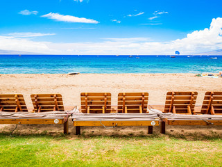 Beach sunbed on Kaanapali Beach, Maui, Hawaii. With three miles of white sand and crystal clear...