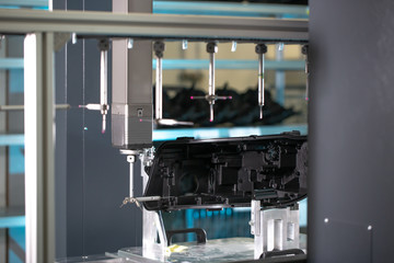 Close up of a 3D dimension measurement plastic parts by CMM, 3D automatic measuring system
