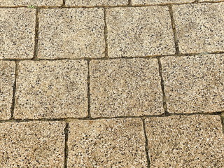 Concrete sidewalk pavement texture useful as a background