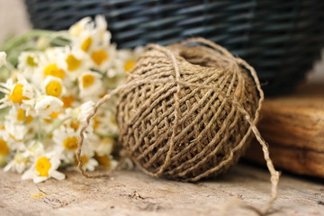 ball of yarn on wooden background
