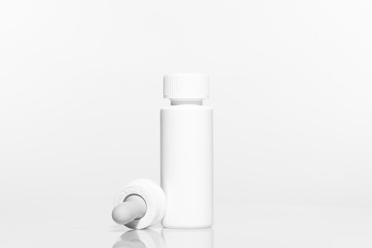 Blank plastic Bottle with Dropper Cap on white background. Plastic bottle Packaging Mockup set ready for your design. High-resolution photo.