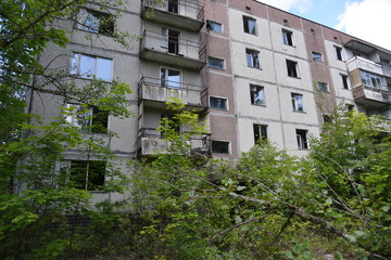 Fototapeta premium Abandoned Pripyat city at Chernobyl Exclusion Zone. Summer 2019.