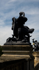Sculpture of Emmanuel Fremiet depicting a pelican and a snake in the Świerklaniec Park. Ready for entry.
