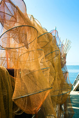 fishing nets colored yellow and red called pots ideal for lake fishing