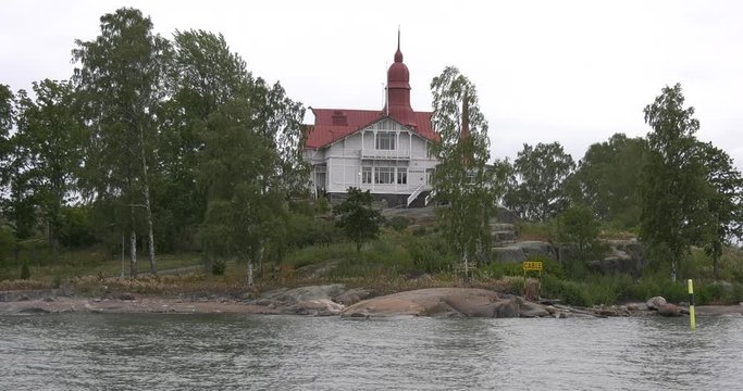 4K Helsinki Baltic Sea Finnish Bay lagoon, yachts, cruise liners view on cloudy summer day video, Luoto Island green park, old beautiful red roof mansion in Finland, northern Europe