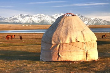 The ger camp in a large meadow at Song kul lake , Naryn of Kyrgyzstan - 349949777