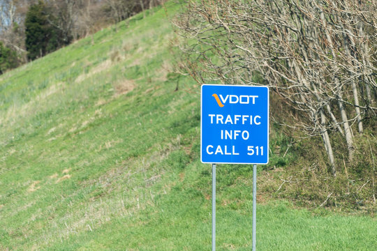 Markham, USA - April 18, 2018: Virginia Department of Transportation VDOT blue road highway sign with traffic info or information and call 511 number